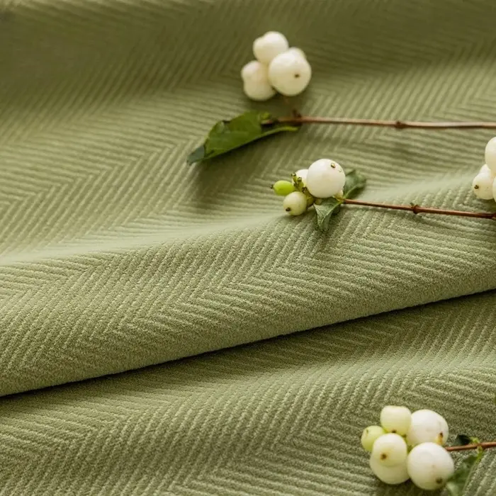 Voilage occultant en velours isolant vert matcha à texture chevrons nordique pour salon