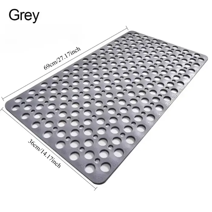 Tapis de bain avec trous de drainage
