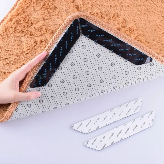 Autocollant antidérapant pour tapis