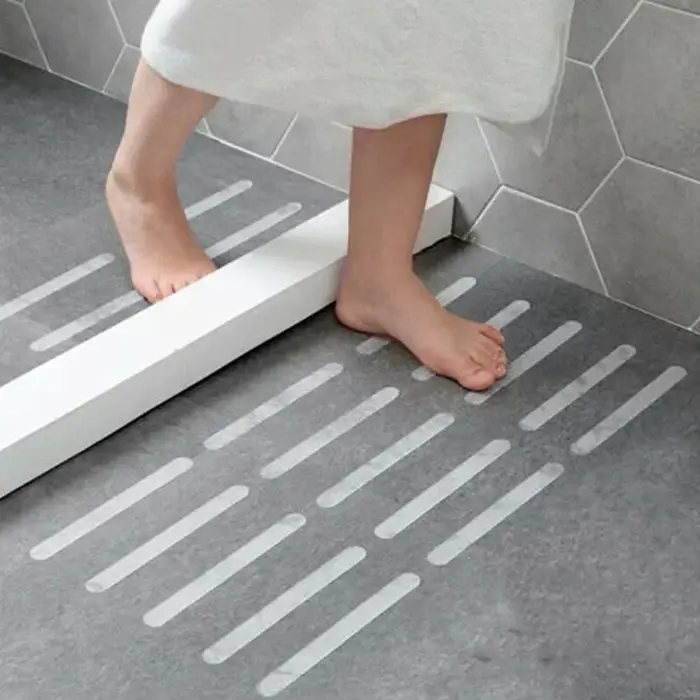 Bandes antidérapantes, tapis de baignoire et de douche