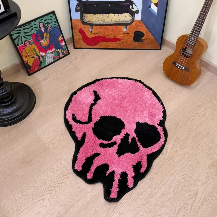 Tapis capitonné en forme de crâne rose