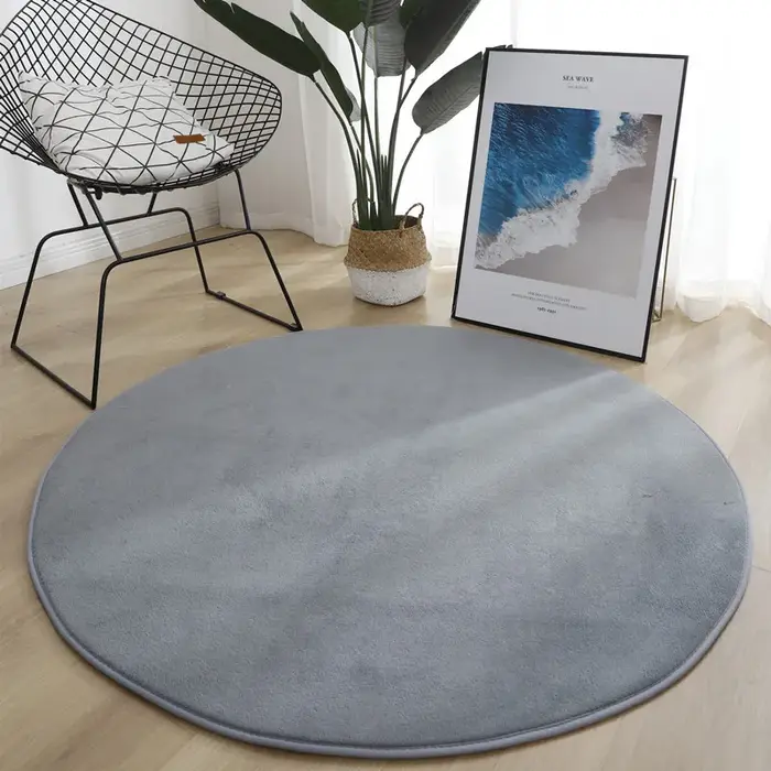 Tapis rond en velours corail pour salon moderne