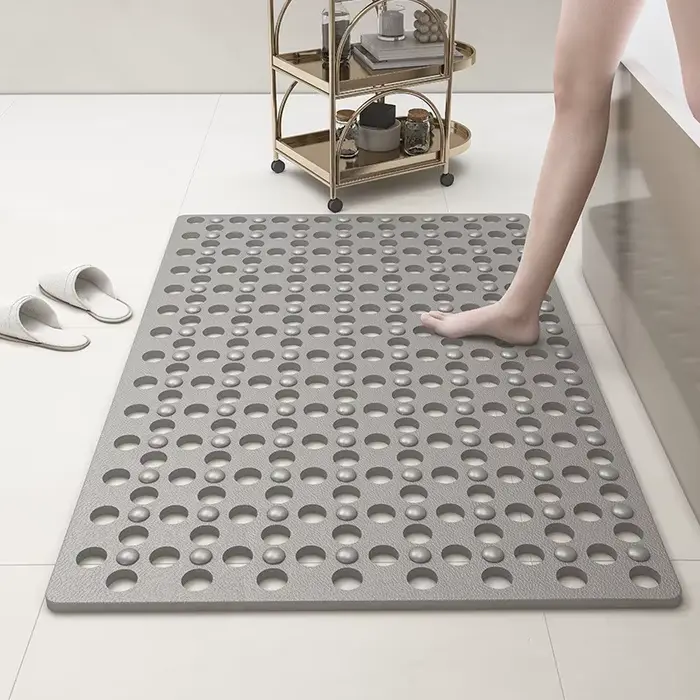 Tapis de bain antidérapant avec trous de vidange