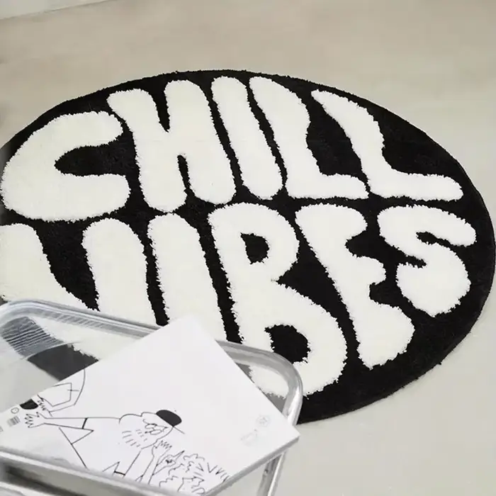Tapis de sol créatif rond rayé noir et blanc VIKAMA