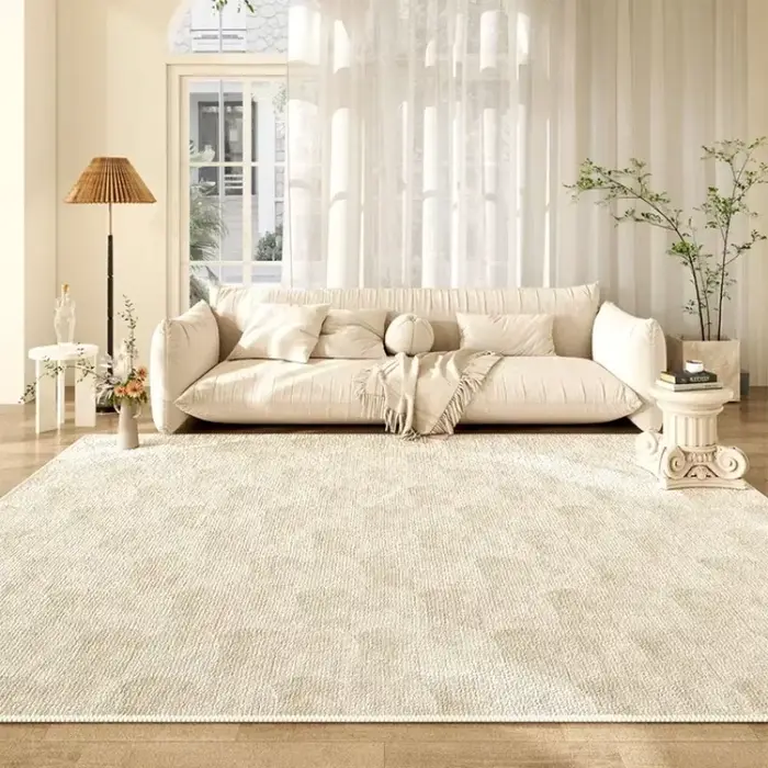 Tapis de grande surface beige à motif géométrique
