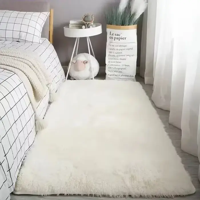 Tapis moelleux en peau de mouton blanc crème