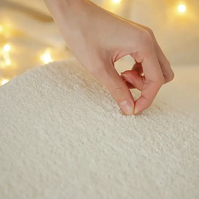 Tapis rond irrégulier en peluche