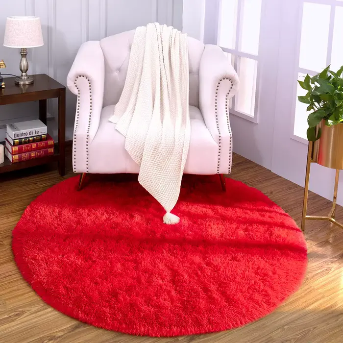 Tapis rouge rond pour chambre d'enfant