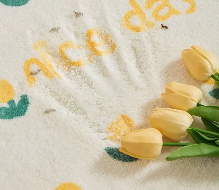 Tapis de sol en peluche à fleurs