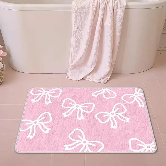 Tapis de bain rose avec nœud papillon VIKAMA