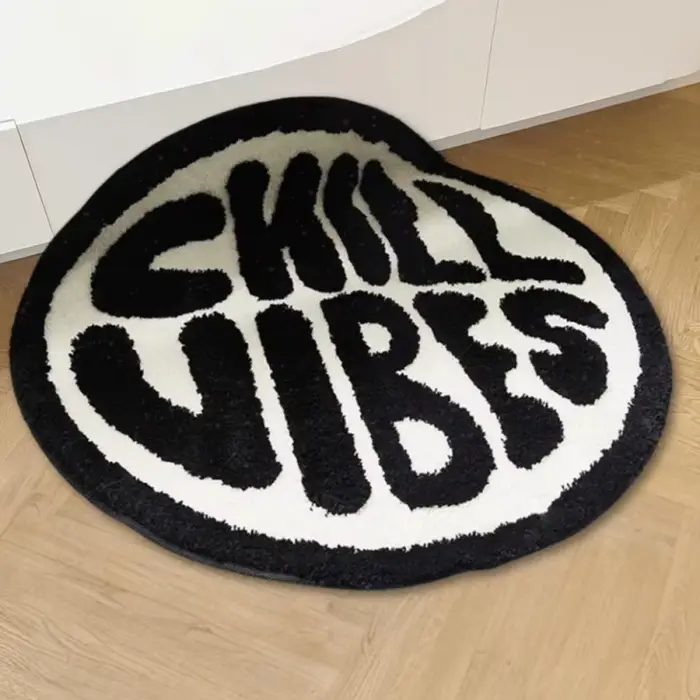 Tapis de sol créatif rond rayé noir et blanc VIKAMA